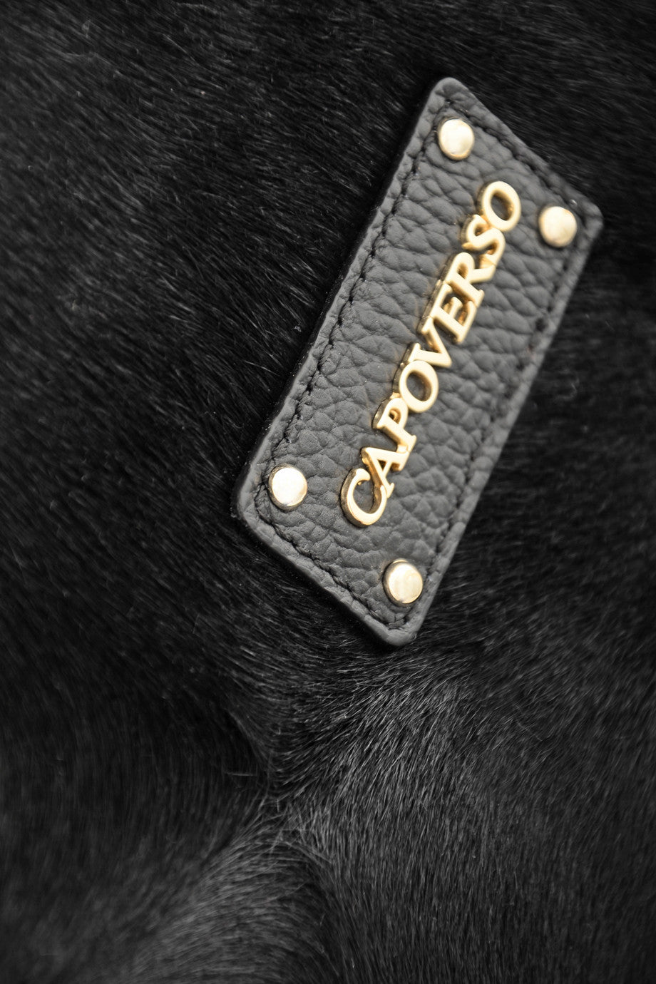 CAPOVERSO CAVALLINO Bolso de Piel Negro con Pelo de Potro
